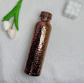 Bouteille en cuivre martelé MoonRose de 800ml, élégante et durable, idéale pour le bien-être quotidien.